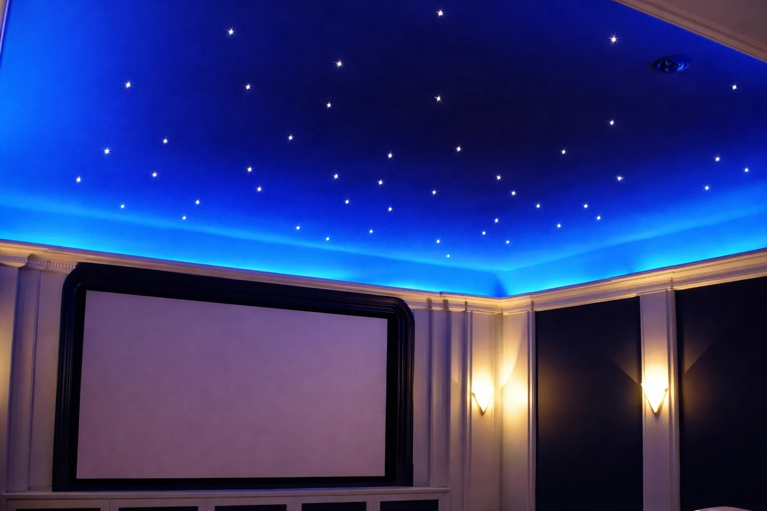 Immersive home theatre with a starry night sky ceiling and large projection screen