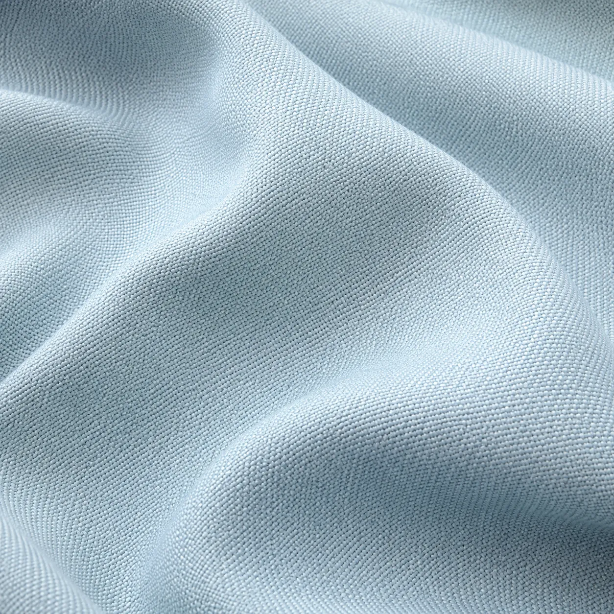 Soft, deep-toned fabric with textured waves and folds