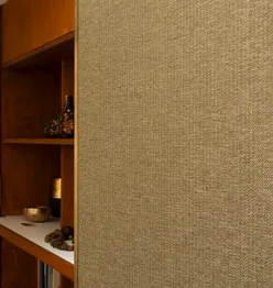 Softly draped sage green fabric with a subtle woven texture